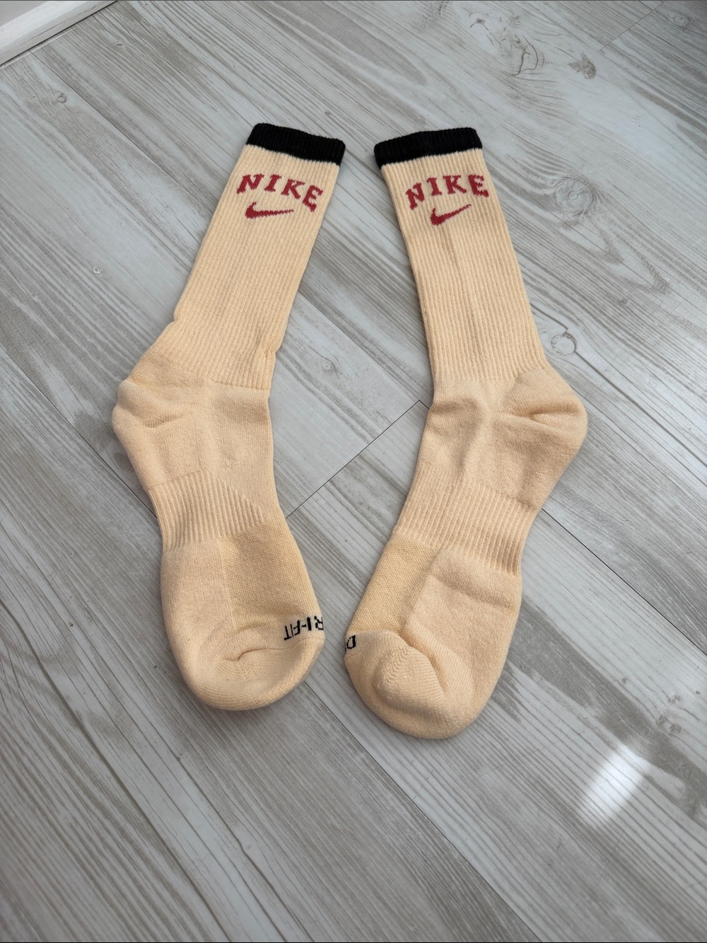 Nike Cream Crew Socks with Black Cuff and Red Logo